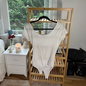 cute white bodysuit from local boutique